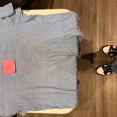 T shirt, zoals gemeld door Amsterdam ID Aparthotel met iLost