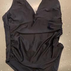 Costumi da bagno, come riportato da Attractie- & Vakantiepark Slagharen utilizzando iLost