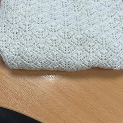 Maglione, come riportato da Sheraton Brussels Airport Hotel utilizzando iLost