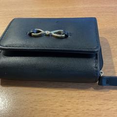 Wallet Bushnell, as reported by Gemeente Amsterdam - Bureau Gevonden Voorwerpen using iLost