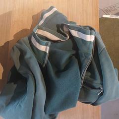 Green vest, como reportado por Conscious Hotel Westerpark utilizando o iLost