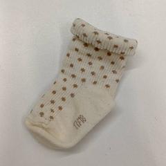 Strumpa blanche à pois marron, rapporterat av IKEA Clermont Ferrand med iLost