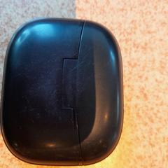 Etui airpods noir, a été signalé par TCL utilisant iLost