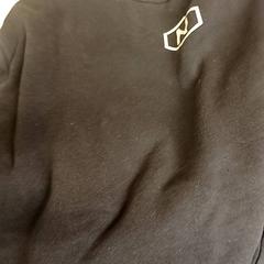 Sveter Zwart sweater, ako bolo nahlásené Heidelberglaan 7 pomocou iLost