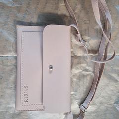 Roze Shein tasje, come riportato a iLost