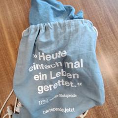 Tasje kleding, rapporterat av Qbuzz DMG med iLost