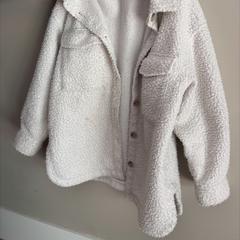 Casaco Wolle witte vest/jas h&m, como reportado por Hotel Apeldoorn utilizando o iLost