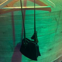 Bags small black, as reported by Club Nyx/Exit Café using iLost