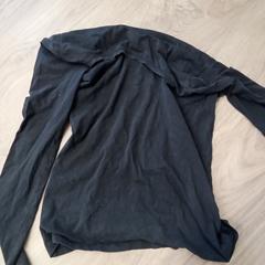 T-shirt, segons ha informat komm schon Alter / De Zon mitjançant iLost