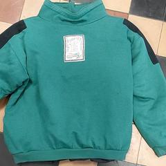 Kleding - Groene trui, zoals gemeld door Regio Limburg - Leuven met iLost