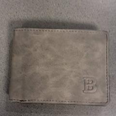 Plånbok Haarun, rapporterat av Breng Nijmegen med iLost