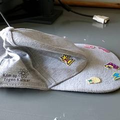 Kläder - Kinderpet, rapporterat av Regio Oost-Vlaanderen med iLost