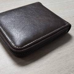 Portefuille bruin leder, rapporterat av Regio Limburg - Leuven med iLost