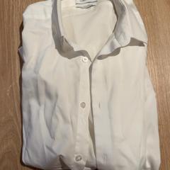 Clothing Witte blouse, gisa salatu by Van der Valk Hotel Eindhoven - Best iLost erabiliz