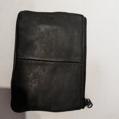 Porte-monnaie noir, zoals gemeld door TCL met iLost