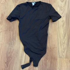 Camisa Donkerbruin., segons ha informat GVB mitjançant iLost