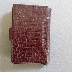 Peňaženka - Hegge, ako bolo nahlásené Centraal magazijn pomocou iLost