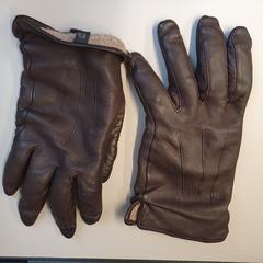 Bruine leren handschoenen, som rapporterats till iLost
