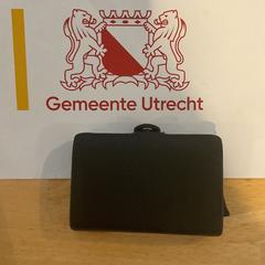 Bruine pasjeshouder Bruin, a été signalé par Gemeente Utrecht utilisant iLost