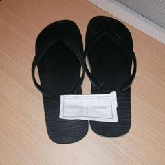 Schuh black flip flop, gemeldet von The Dominican über iLost
