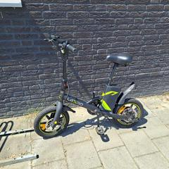 Bicicletta pieghevole elektrisch Lexgo kleur zwart met groen, come riportato da Gemeente Heusden utilizzando iLost