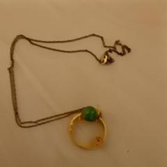 Necklace Silver gold green, as reported by Mövenpick Hotel Amsterdam City Centre using iLost