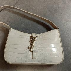 Bolsa - handtas, segundo informou Regio Oost-Vlaanderen usando iLost