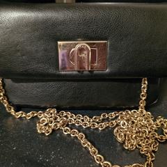 Zwart met Goud tasje, as reported to iLost