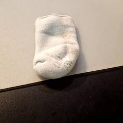 Meia chaussette bébé blanche, como reportado por IKEA Hénin-Beaumont utilizando o iLost