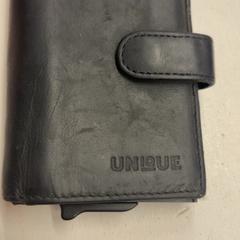 Portemonnee Nirmalsingh, zoals gemeld door HTM met iLost