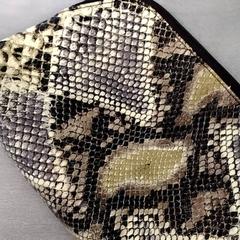 Kulturbeutel Slangenprint, gemeldet von Arriva Friesland / Groningen über iLost