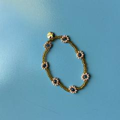 Bracelet Gold with beaded flowers, zoals gemeld door Groninger Museum met iLost