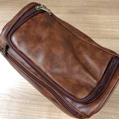 Borsa da toilette, come riportato da Connexxion Haarlem AML utilizzando iLost