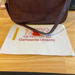 Bruin damestasje, iLost를 사용하여 Gemeente Utrecht에 보고됨