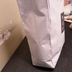 İLost kullanarak TCL tarafından bildirildiği gibi Çanta papier blanc