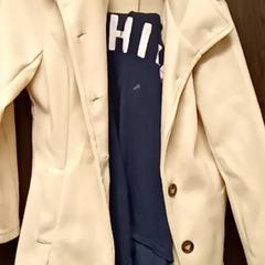 Blazer & Shirt    Beige & bleu, as reported by Mövenpick Hotel Amsterdam City Centre using iLost