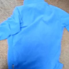 Kleidung & Vliesweste Blue, gemeldet von Mövenpick Hotel Amsterdam City Centre über iLost