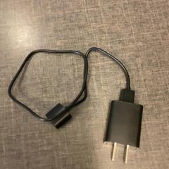 Adapter Noir, zoals gemeld door MEININGER Hotel Brussels City Center met iLost