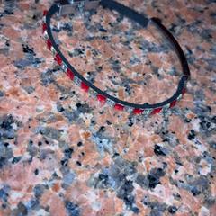 Pulsera Armband, rode en zilvere stenen, ha sido reportado por Pathé Nijmegen con iLost