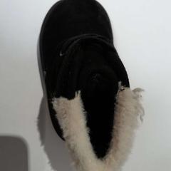 Chaussure noire, a été signalé par TCL utilisant iLost