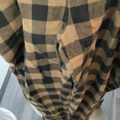 Pantalones Checkered, ha sido reportado por MEININGER Hotel Berlin Central Station con iLost