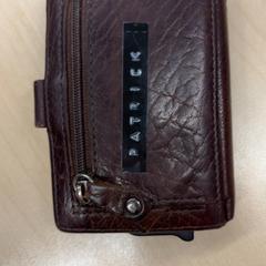 Peňaženka Patrick, ako bolo nahlásené Pathé Schouwburgplein pomocou iLost