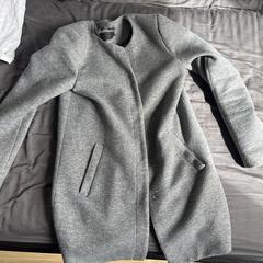 Grijze jas, gerapporteerd met iLost