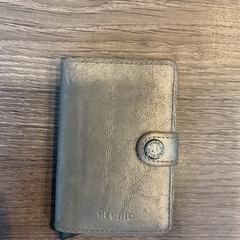 Titular da paixón Hamming ld, segundo informou Gemeente Amsterdam - Bureau Gevonden Voorwerpen usando iLost