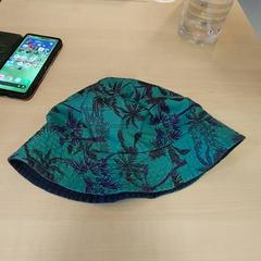 Bucket hatt Vert avec palmier, rapporterat av IKEA Strasbourg med iLost