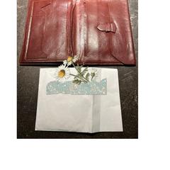 Rood bruine portemonnee, gerapporteerd met iLost