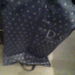 Giacca DS Damat - on hanger, come riportato da The Tire Station Hotel utilizzando iLost