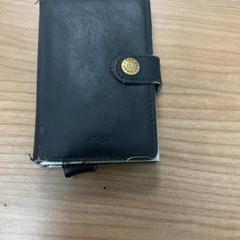 Wallet Zwart, as reported by Connexxion Amstelland-Meerlanden Schiphol Noord using iLost