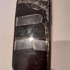 Téléphone portable noir Samsung, a été signalé par TCL utilisant iLost