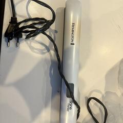 Lisseur à cheveux, a été signalé par Inntel Hotels Utrecht Centre utilisant iLost